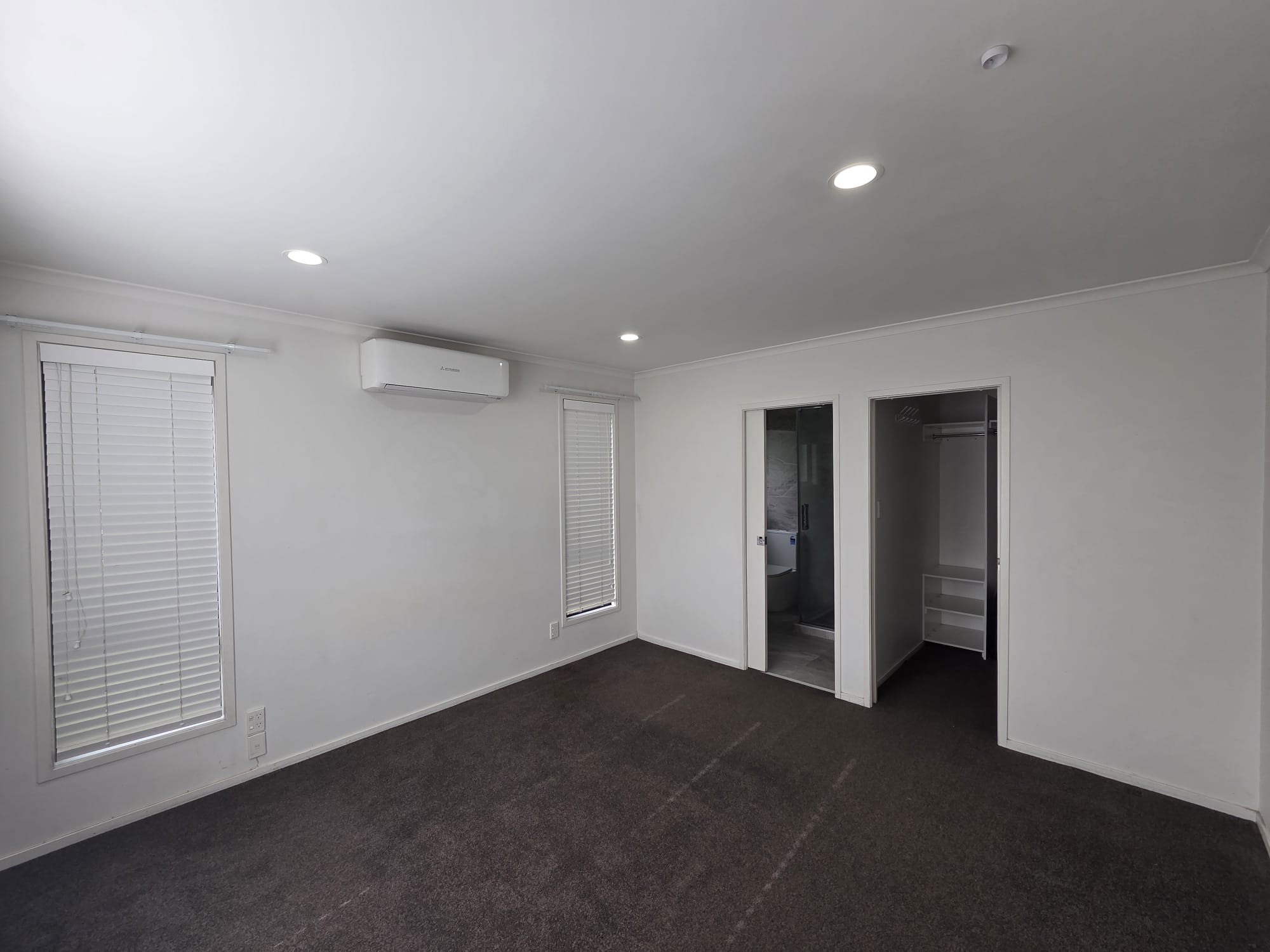Modern Four-Bedroom Flat Bush Home with Dual Living Spaces