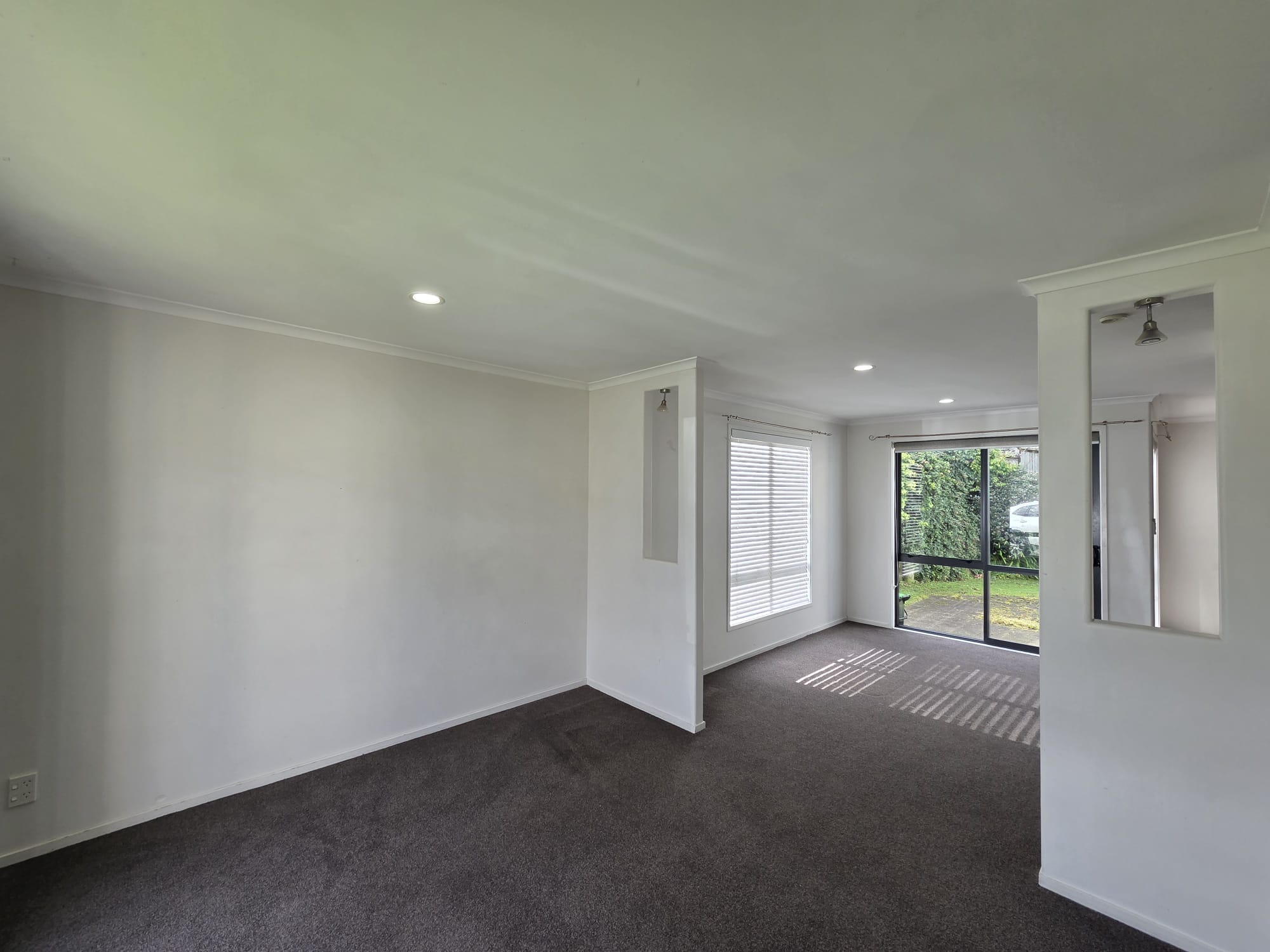 Modern Four-Bedroom Flat Bush Home with Dual Living Spaces