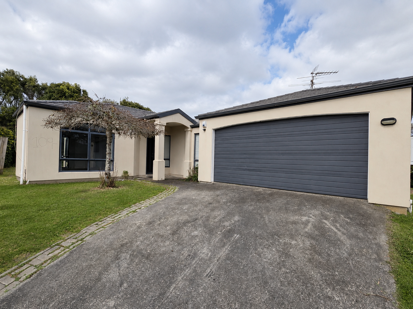 Modern Four-Bedroom Flat Bush Home with Dual Living Spaces