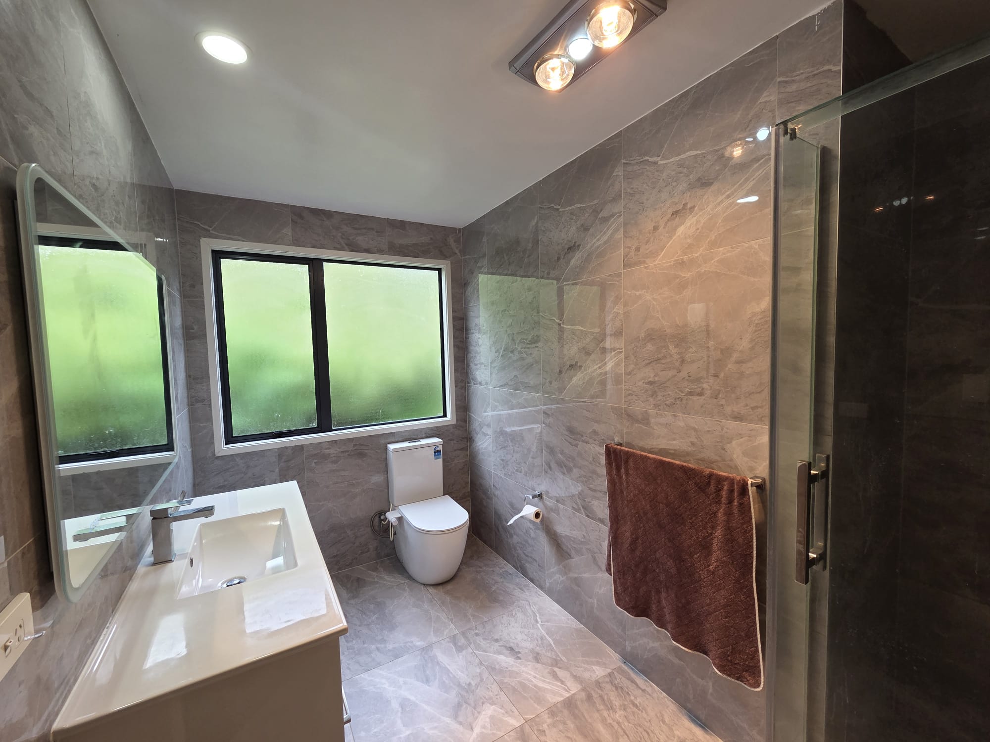 Modern Four-Bedroom Flat Bush Home with Dual Living Spaces